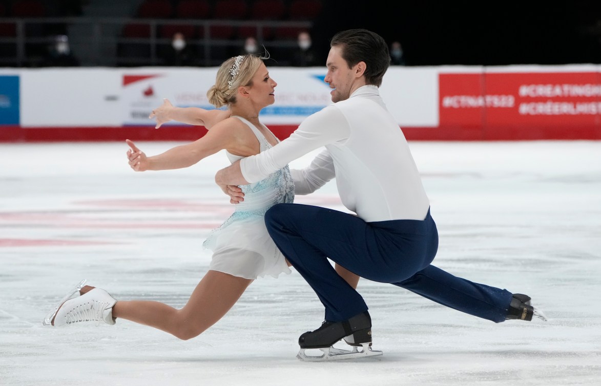 Kirsten Moore-Towers and Michael Marinaro doing a pairs spin 