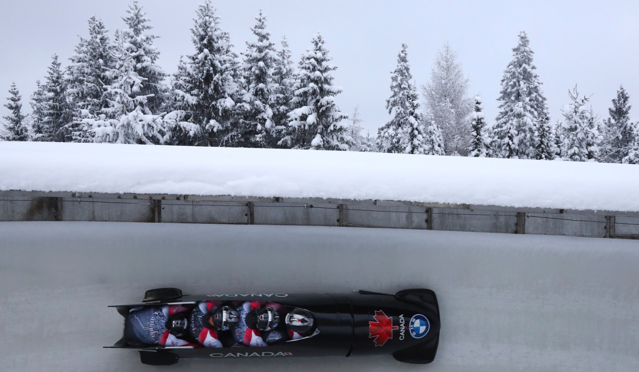 Team Christopher Spring, Mike Evelyn, Mark Mlakar and Chris Patrician of Canada speed down the run during the four-man bobsled race at the Bobsleigh and Skeleton World Championships in Altenberg, Germany, Saturday, Feb.13, 2021.