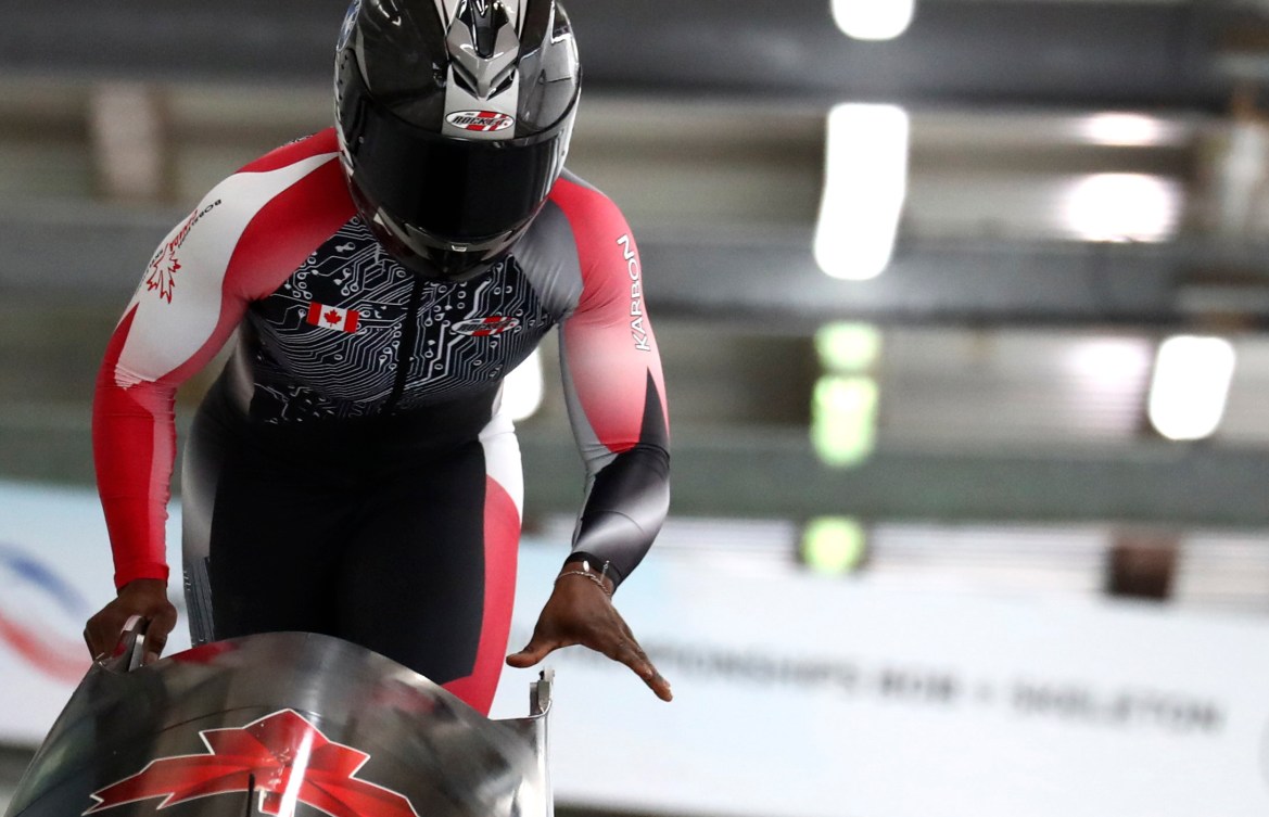 Canada's bobsleigh pilot Cynthia Appiah at the start of the women's monobob race at the Bobsleigh and Skeleton World Championships in Altenberg, Germany, Saturday, Feb.13, 2021. 