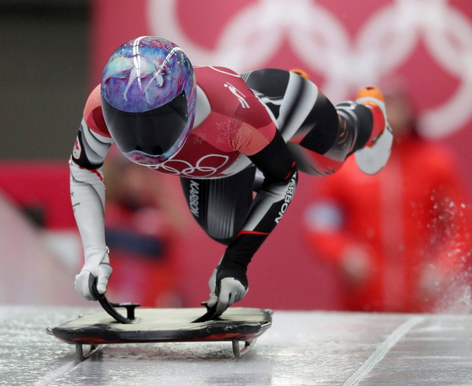 Mirela Rahneva of Canada starts her first run during the women's skeleton competition at the 2018 Winter Olympics in Pyeongchang, South Korea, Friday, Feb. 16, 2018. 