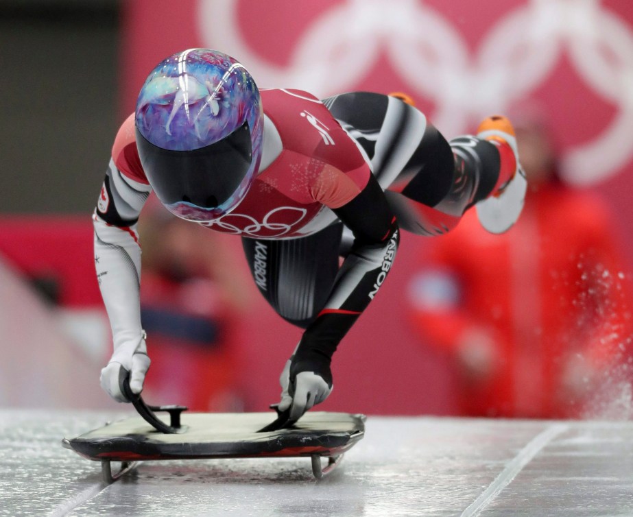 Mirela Rahneva of Canada starts her first run during the women's skeleton competition at the 2018 Winter Olympics in Pyeongchang, South Korea, Friday, Feb. 16, 2018.