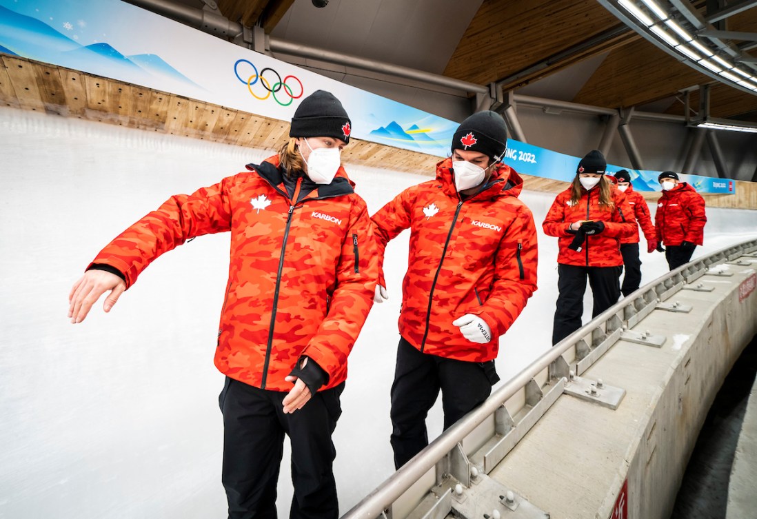 Canada's luge team does a pre-sliding track walk 