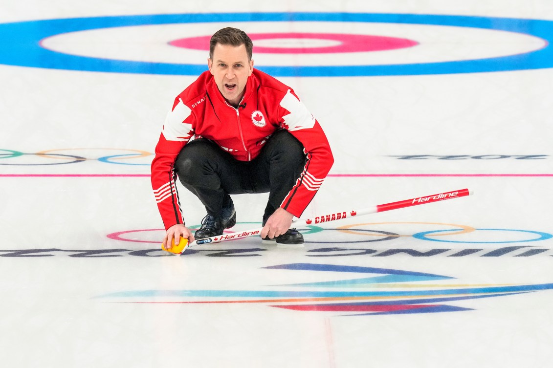 Brad Gushue watches his stone 