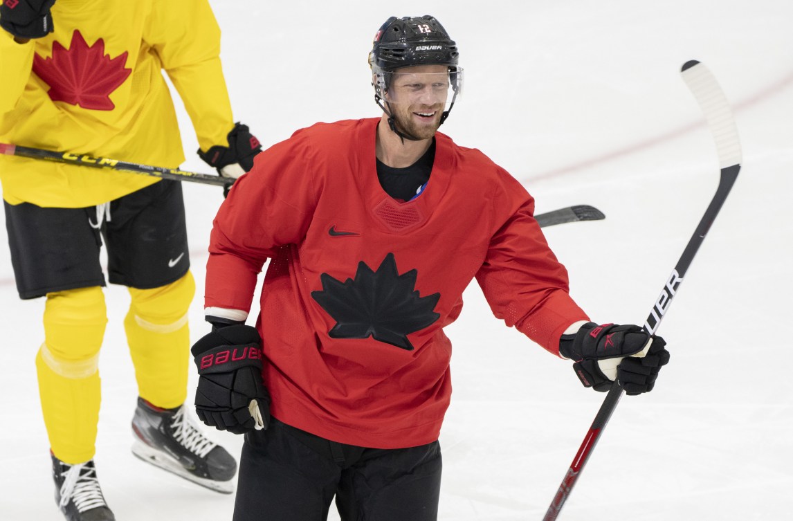 Team Canada forward Eric Staal laughs during a practice