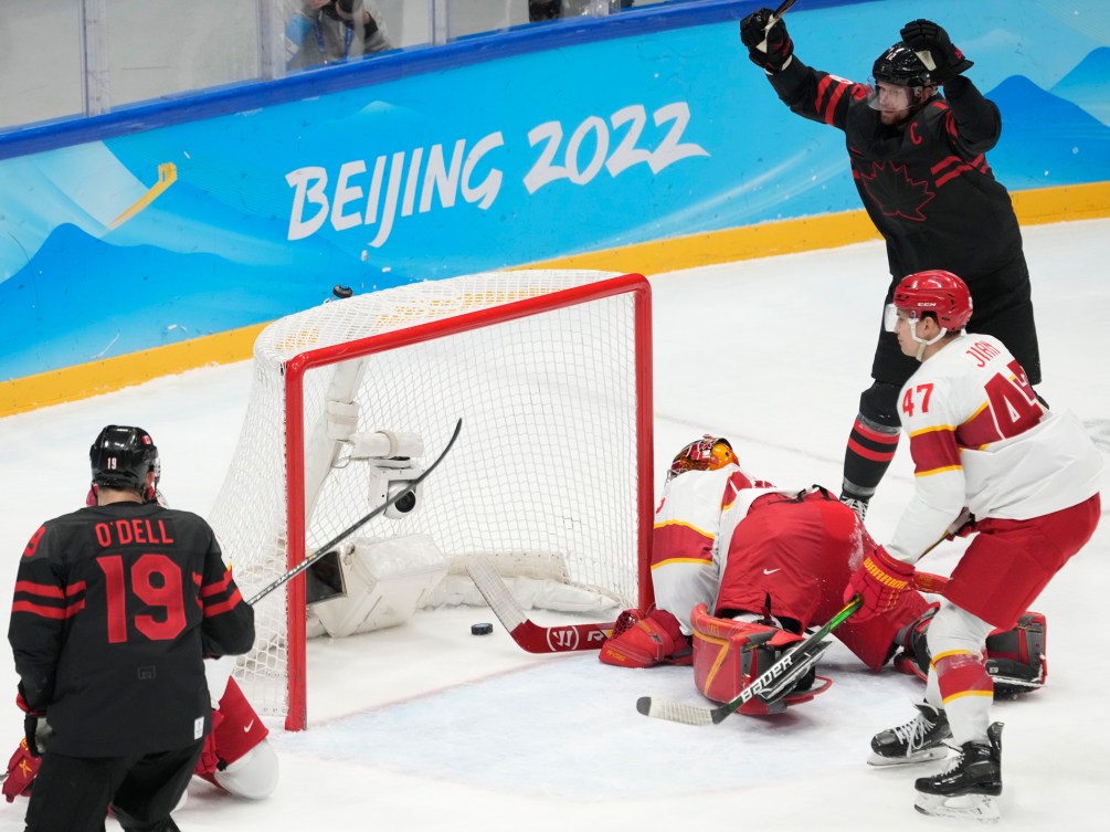 Team Canada forwards Eric Staal (12) and Eric O'Dell (19) celebrate a goal