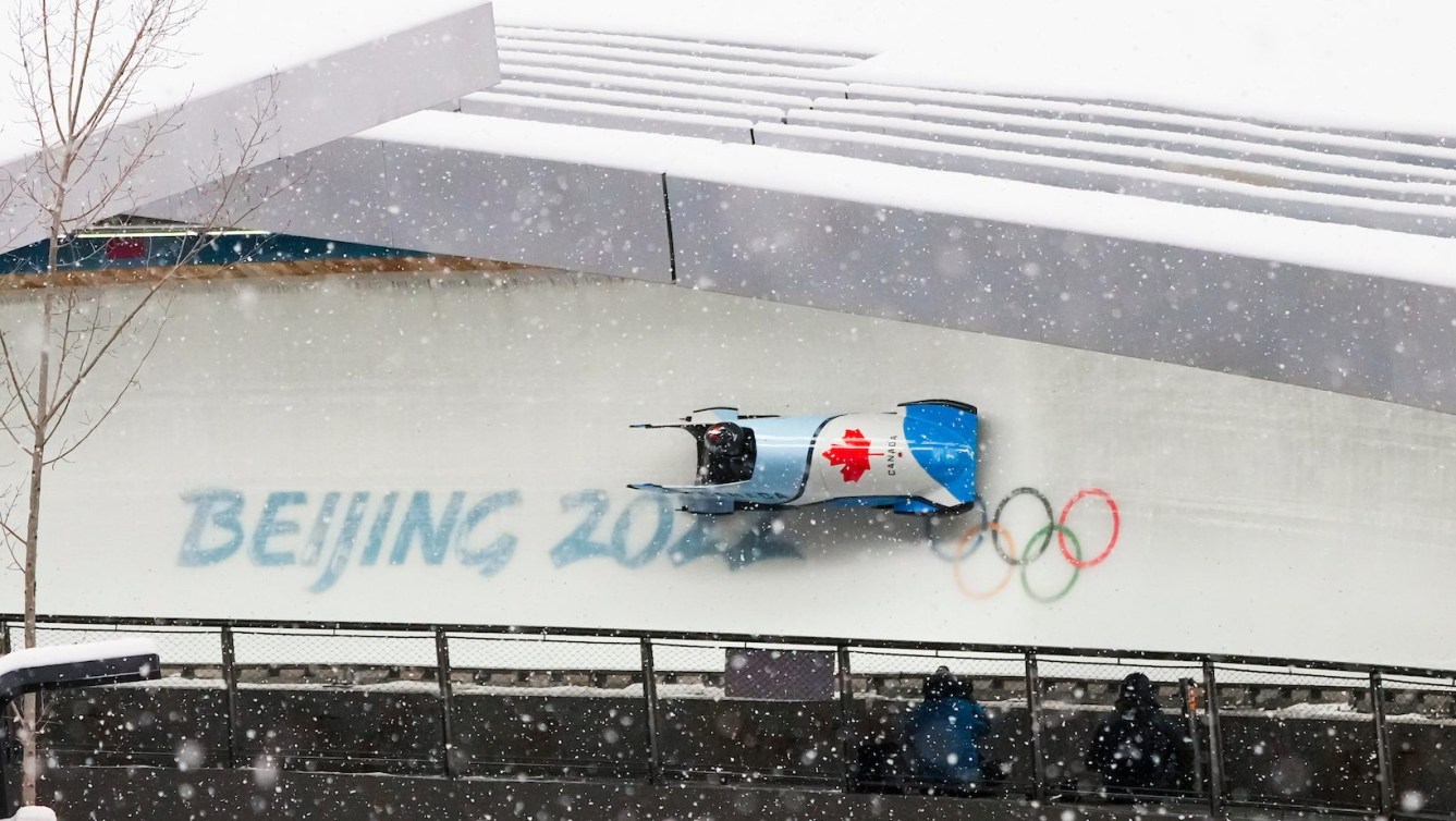 Canadian bobsleigh goes through curve on track