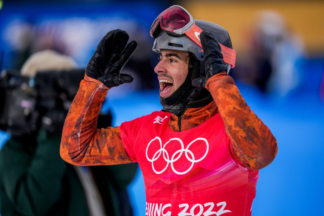 Eliot Grondin lifts his hands to his head in happy reaction