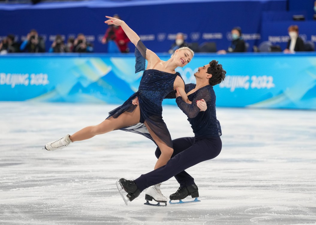 Piper Giles and Paul Poirier do a dance spin