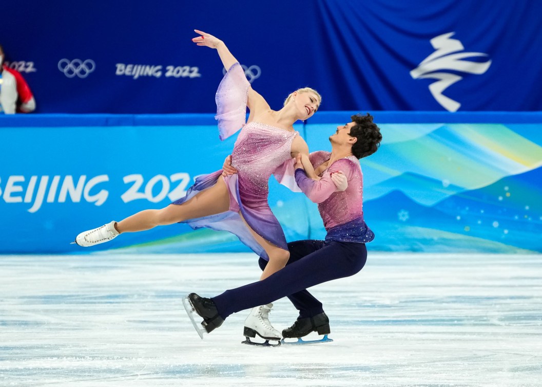 Piper Gilles and Paul Poirier perform a dance spin 
