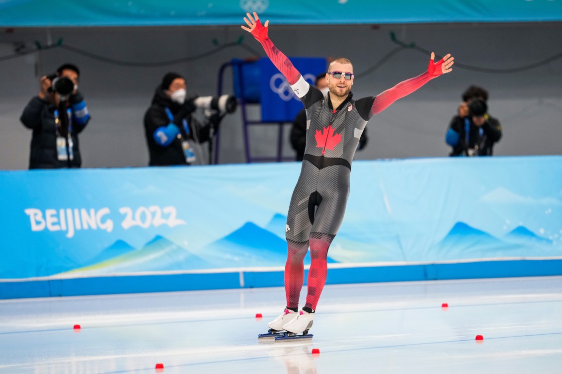 Laurent Dubreuil puts arms up in happy reaction 