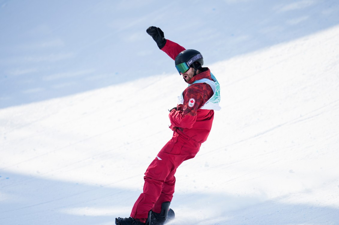 Max Parrot puts his first in the air after landing a jump 