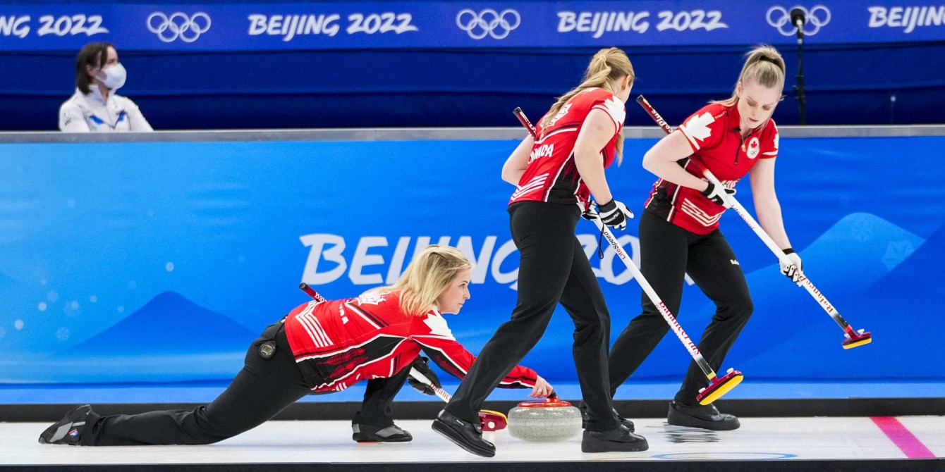 Jennifer Jones throws a stone