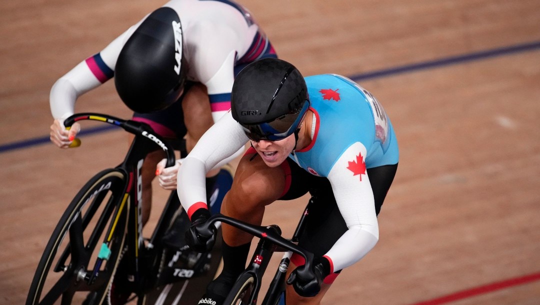 Team Canada's Lauriane Genest makes a push for the finish line during a cycling competition