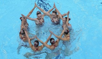 The Canada artistic swimming team competes during the team free routine final at the 2020 Summer Olympics, Saturday, Aug. 7, 2021, in Tokyo, Japan. (AP Photo/Jeff Roberson)