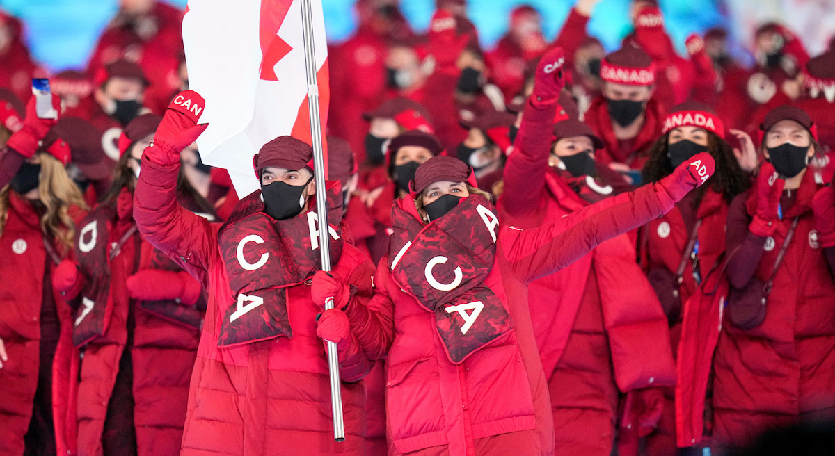 Charles Hamelin and Marie-Philip Poulin lead Team Canada into the opening ceremony at Beijing 2022