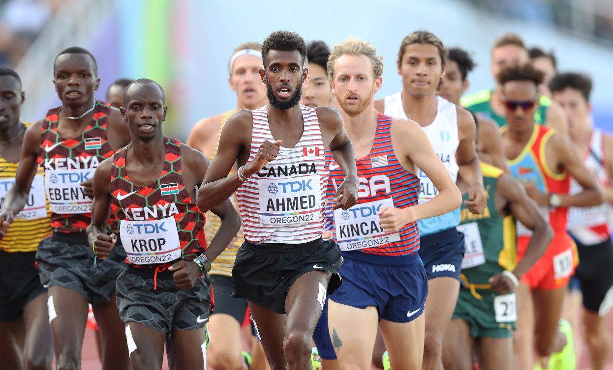 Mohammed Ahmed racing on the track with a lot of competitors