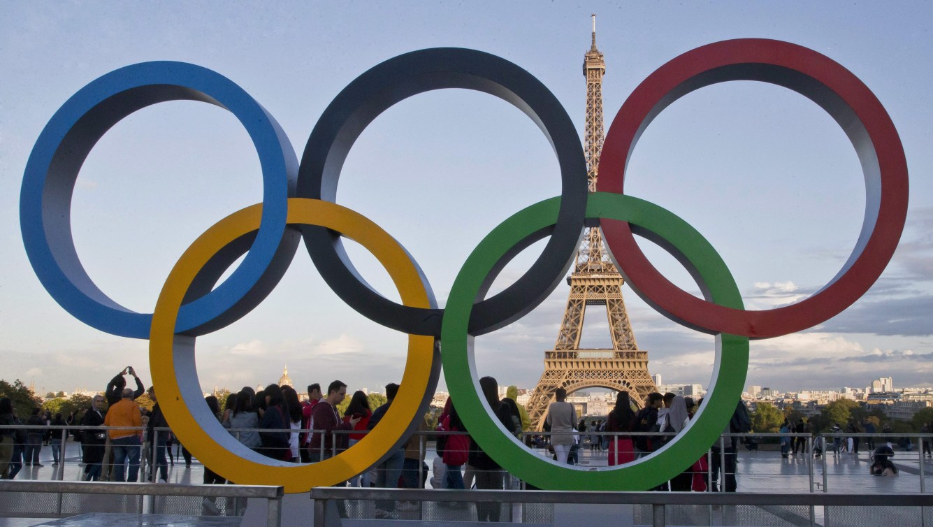 The Olympic Rings in front of the Eiffel Tower