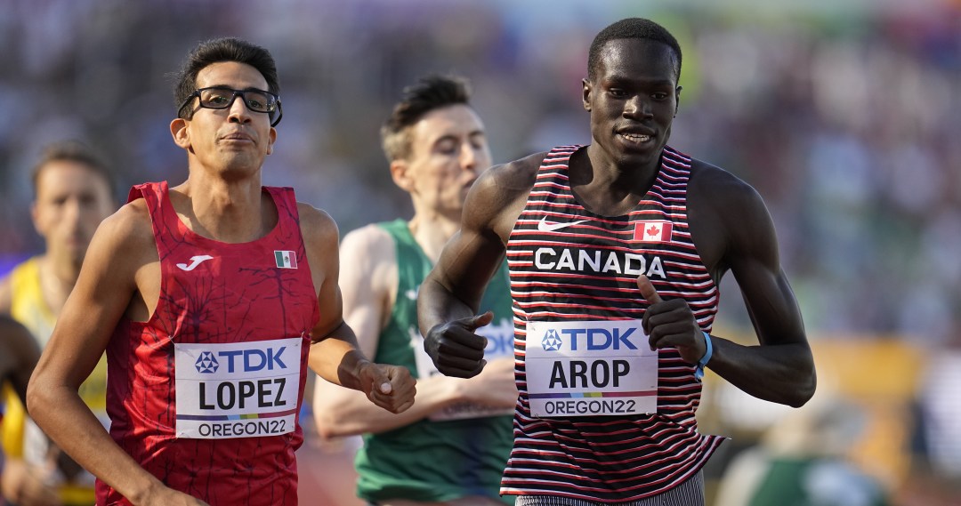 Marco Arop, of Canada, wins during a heat in the men's 800-meter run at the World Athletics Championships on Wednesday, July 20, 2022, in Eugene, Ore. (AP Photo/Ashley Landis)