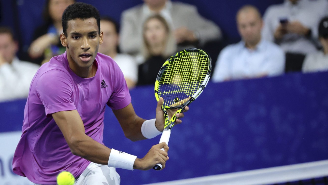 Canada's Felix Auger-Aliassime returns the ball during the men's singles final against United States Sebastian Korda at the European Open tennis tournament in Antwerp, Belgium, Sunday, Oct. 23, 2022. (AP Photo/Olivier Matthys)