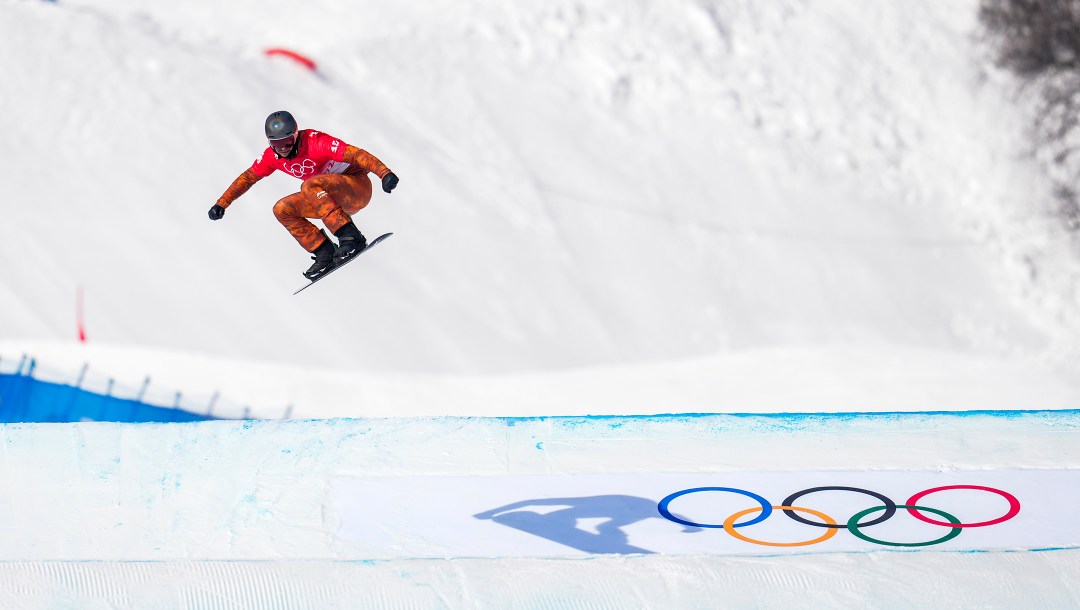 Team Canada snowboarder Eliot Grondin competes in the men’s snowboard cross event during the Beijing 2022 Olympic Winter Games