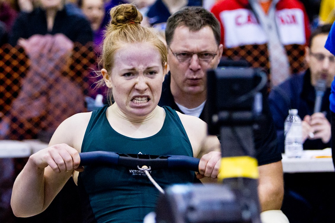 Caileigh Filmer pulls at a rowing erg machine 