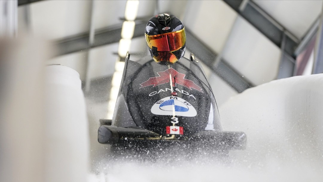 Third placed Cynthia Appiah of Canada finishes after her second run of the Women's Monobob World Cup race in Sigulda, Latvia, Saturday, Feb. 18, 2023. (AP Photo/Oksana Dzadan)