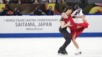 Piper Gilles and Paul Poirier of Canada perform during the ice dance free dance program in the World Figure Skating Championships in Saitama, north of Tokyo, Saturday, March 25, 2023.