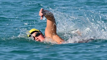 Abby Dunford competes in an open water swimming race