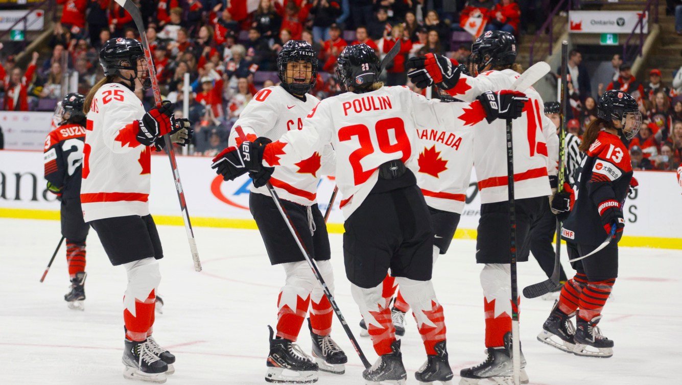 Team Canada celebrates a goal against Japan at the 2023 IIHF Women's World Championship