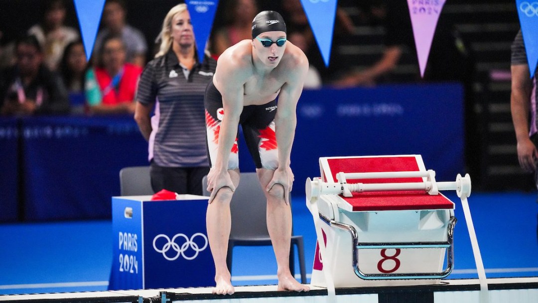 Blake Tierney waits on the side of the pool