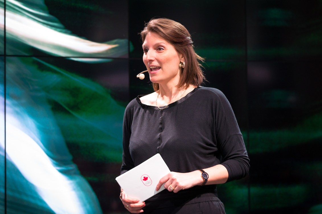 Sandra Sassine speaks from a stage