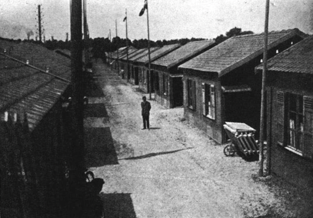 Black and white photo of small wooden houses 