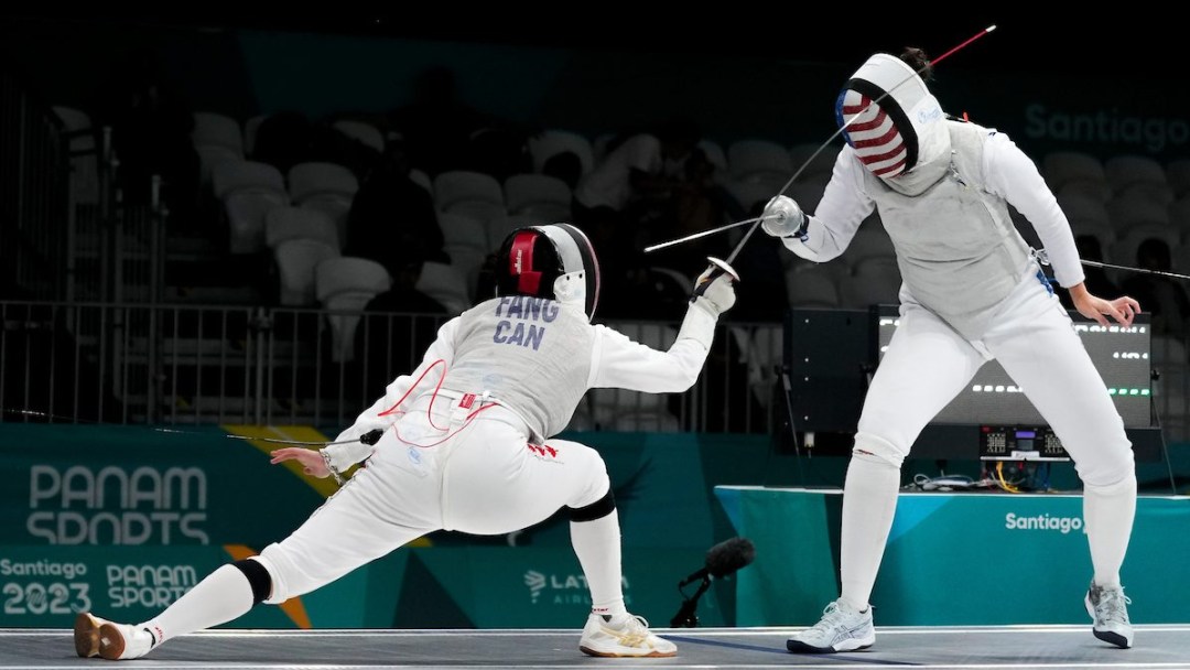 Two fencers duel