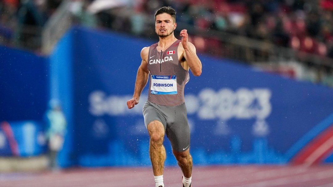 Runner sprints down the track