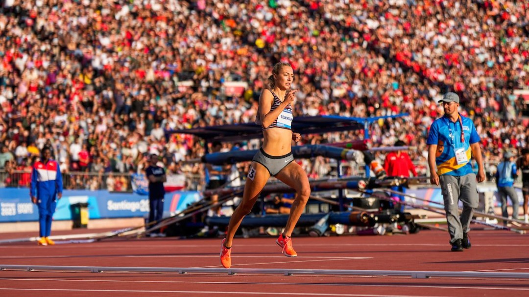 Addy Townsend runs on the track