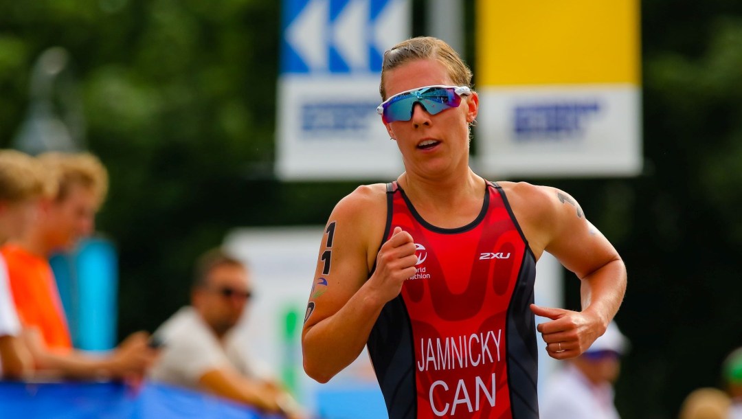 Dominicka Jamnicky competes in the running portion of a triathlon