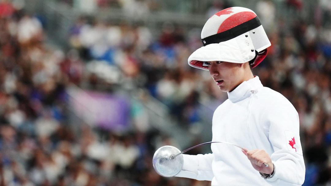 Team Canada’s Nicholas Zhang reacts while competing in Fencing - Men's Epee Individual Table against Gabriel Lugo of Venezuela during the 2024 Paris Olympic Games