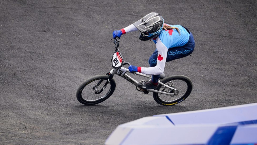 Teigen Pascual rounds a curve on the BMX track