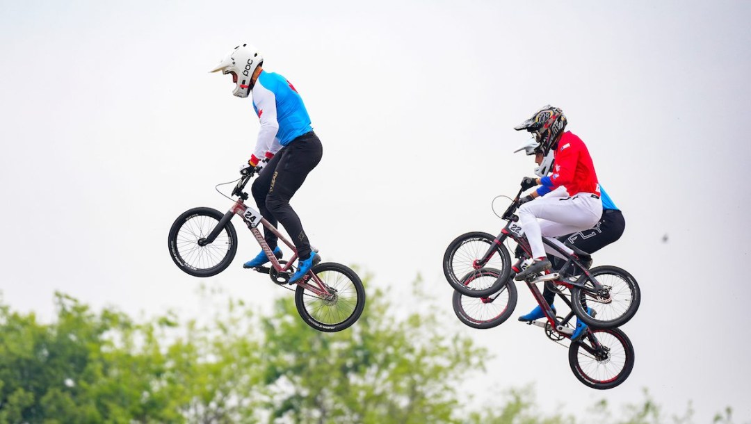 Curtis Krey catches air while racing BMX