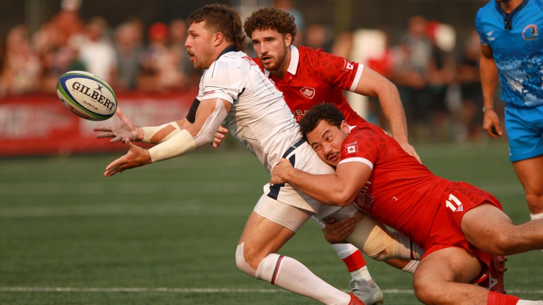 Elias Ergas tackles an opponent