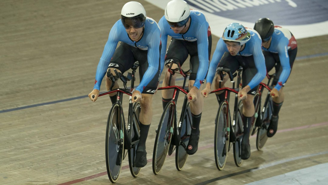 Sean Richardson and teammates ride on the track