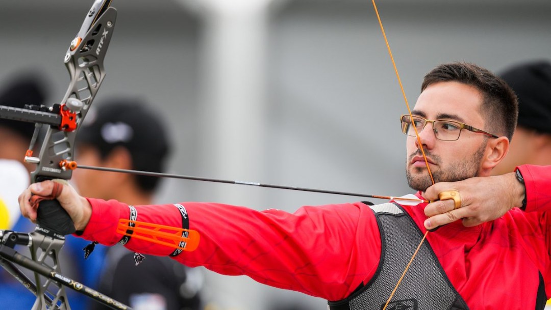 Brandon Xuereb takes aim with his bow