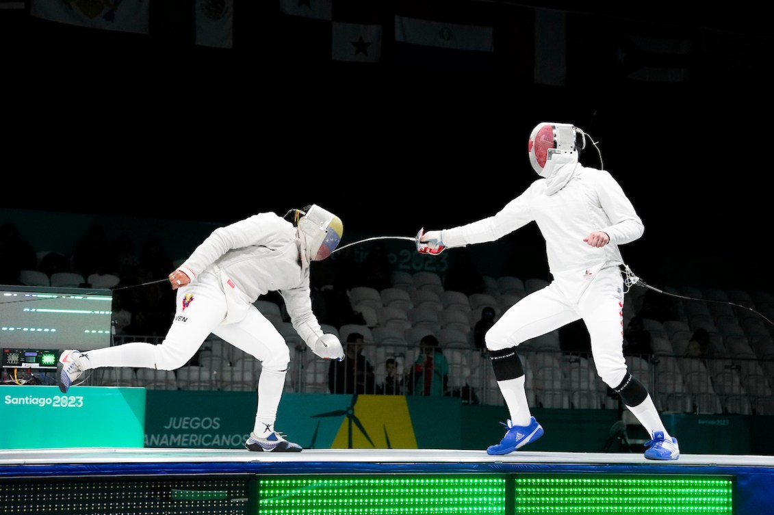 Two fencers duel