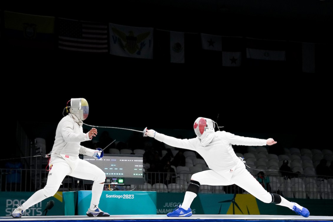 Two fencers duel