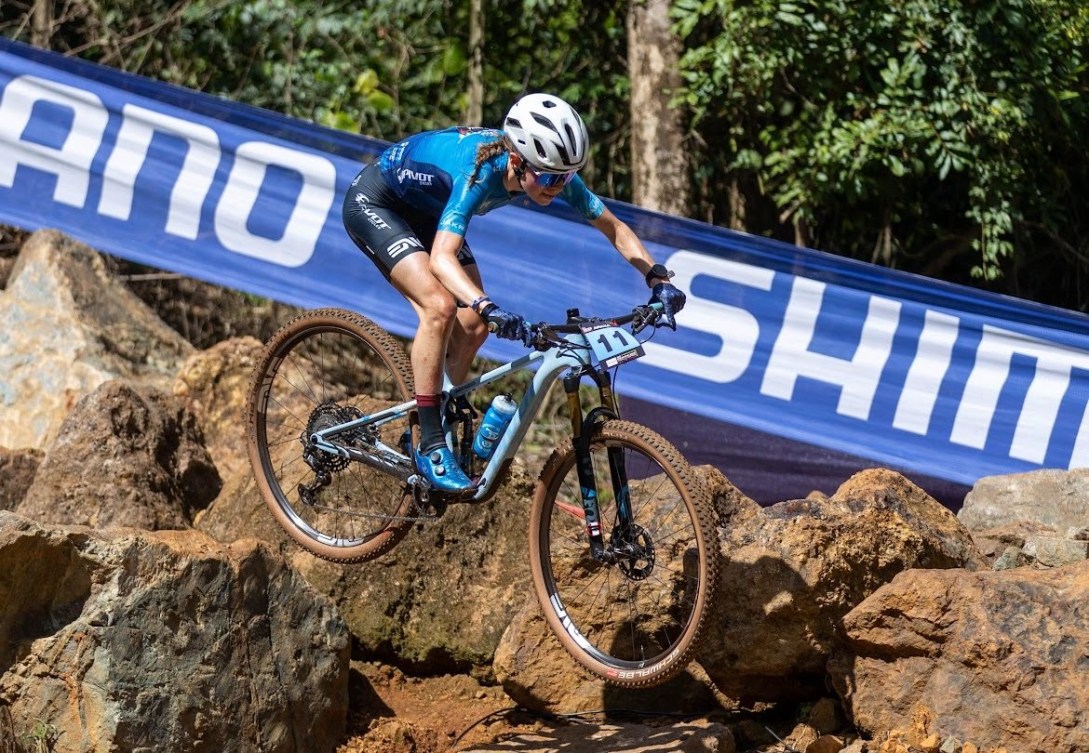 Canadian women's mountain biker Ella MacPhee competing in a race.