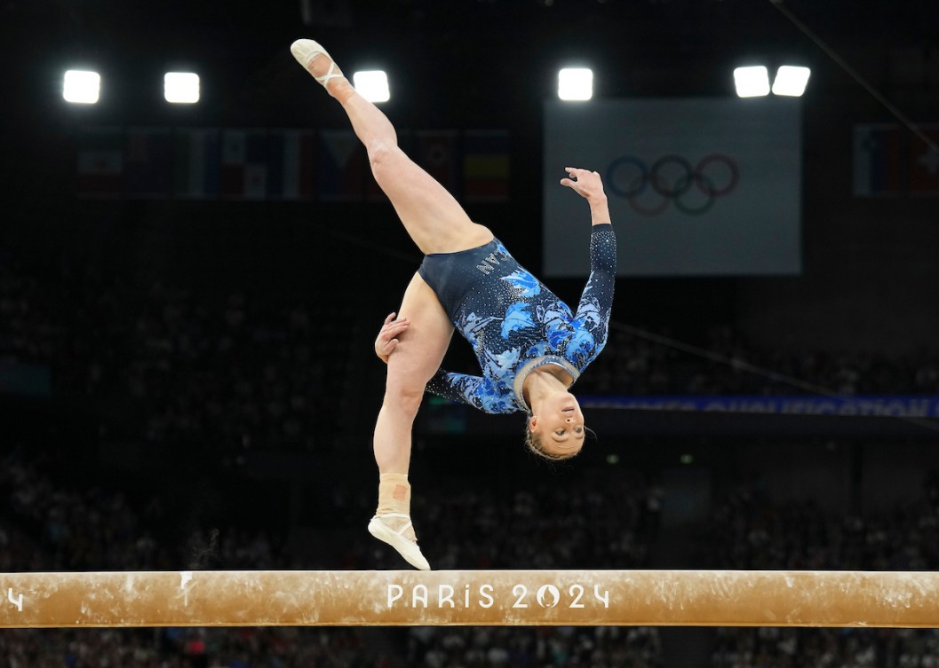 Ellie Black flips on the beam