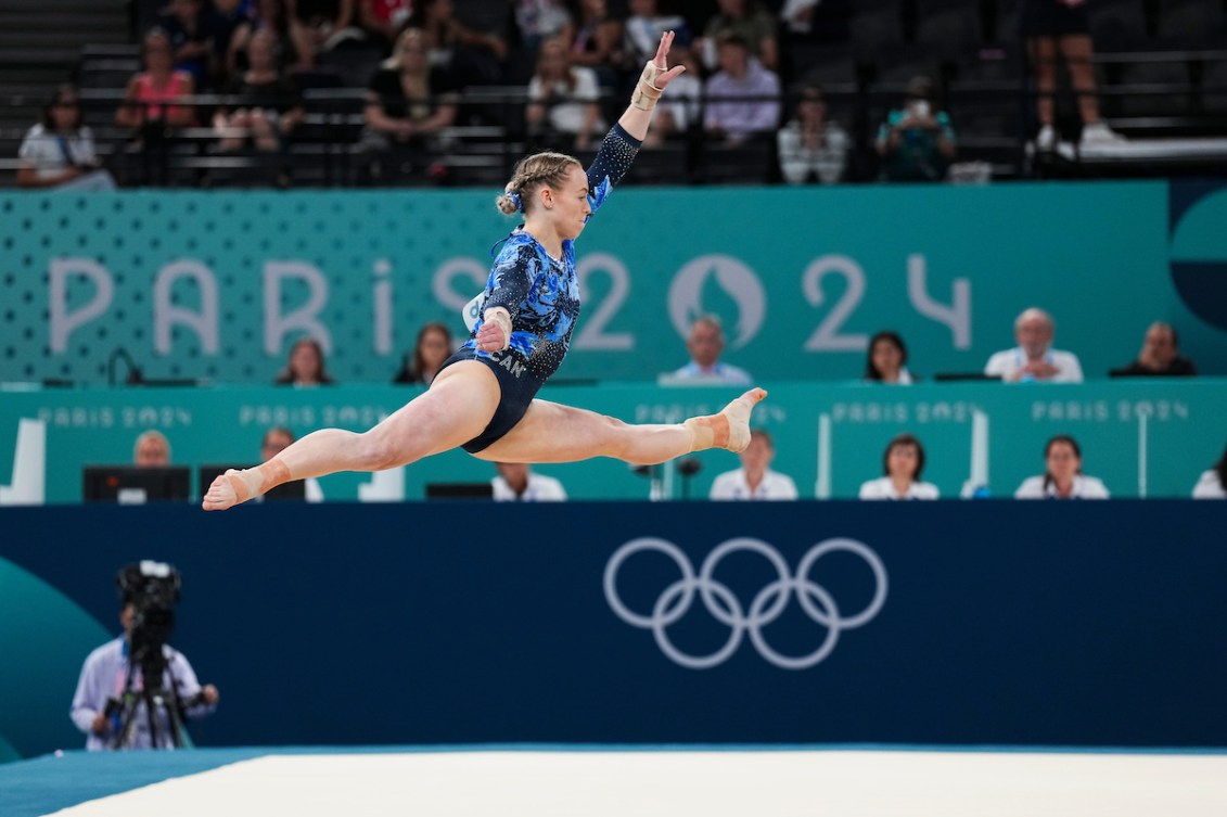 Ellie Black performs a split leap on floor exercise