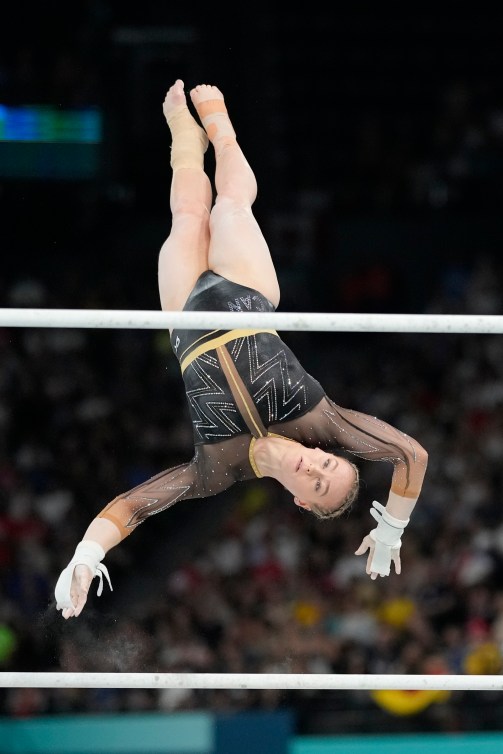 Ellie Black competes on the uneven bars in Paris.