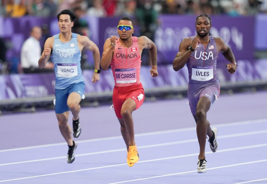 Andre De Grasse competes in the 200m heats on Monday.