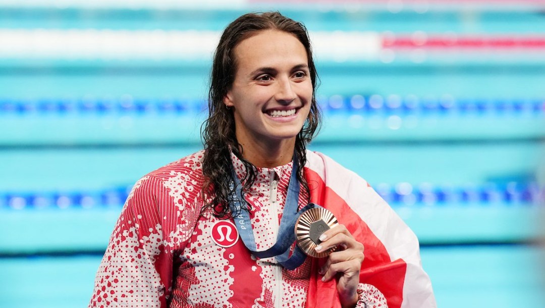 Kylie Masse poses with bronze medal